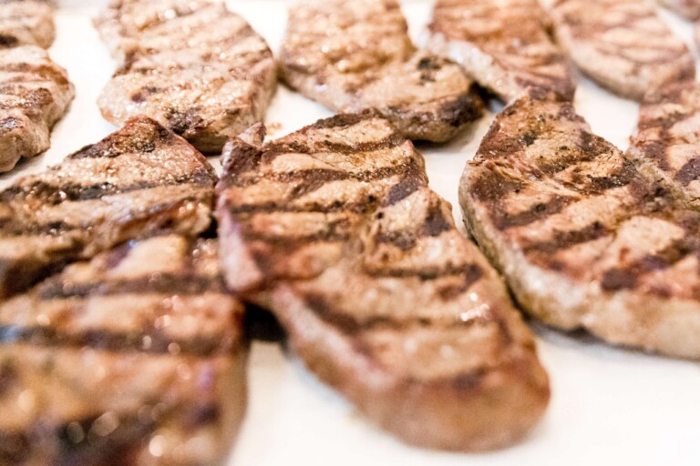 Ancho-marinated steaks meal prep resting after grilling, ready to be sliced