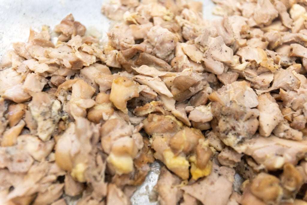 Juicy seared chicken breast chopped into pieces for high-protein harvest bowl