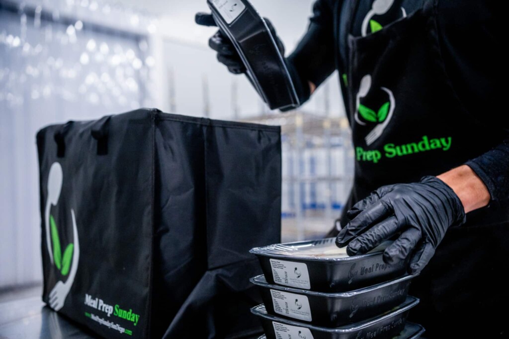  Meals being packed and sealed for delivery – video meal prep spotlight behind the scenes
