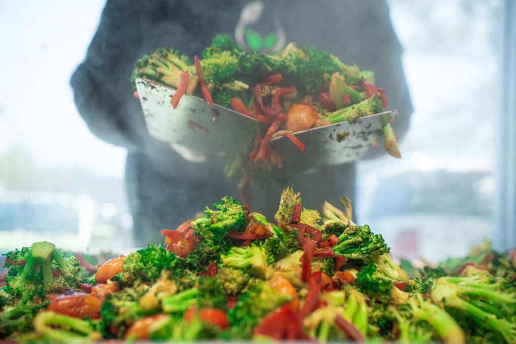  Colorful vegetables cooking on skillet during video meal prep spotlight
