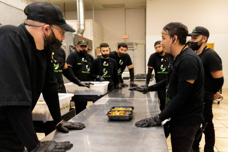 Organized chefs that are coordinated in creating meals such as green harissa turkey meatball.