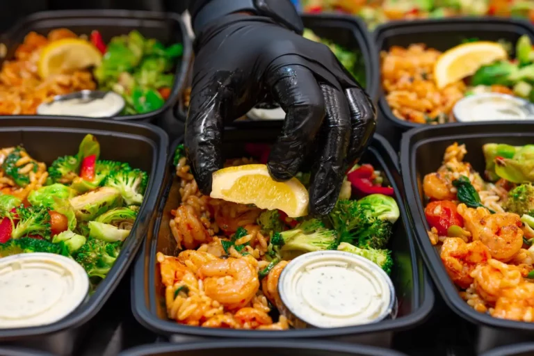 Chef preparing a healthy meal with fresh ingredients in a professional kitchen